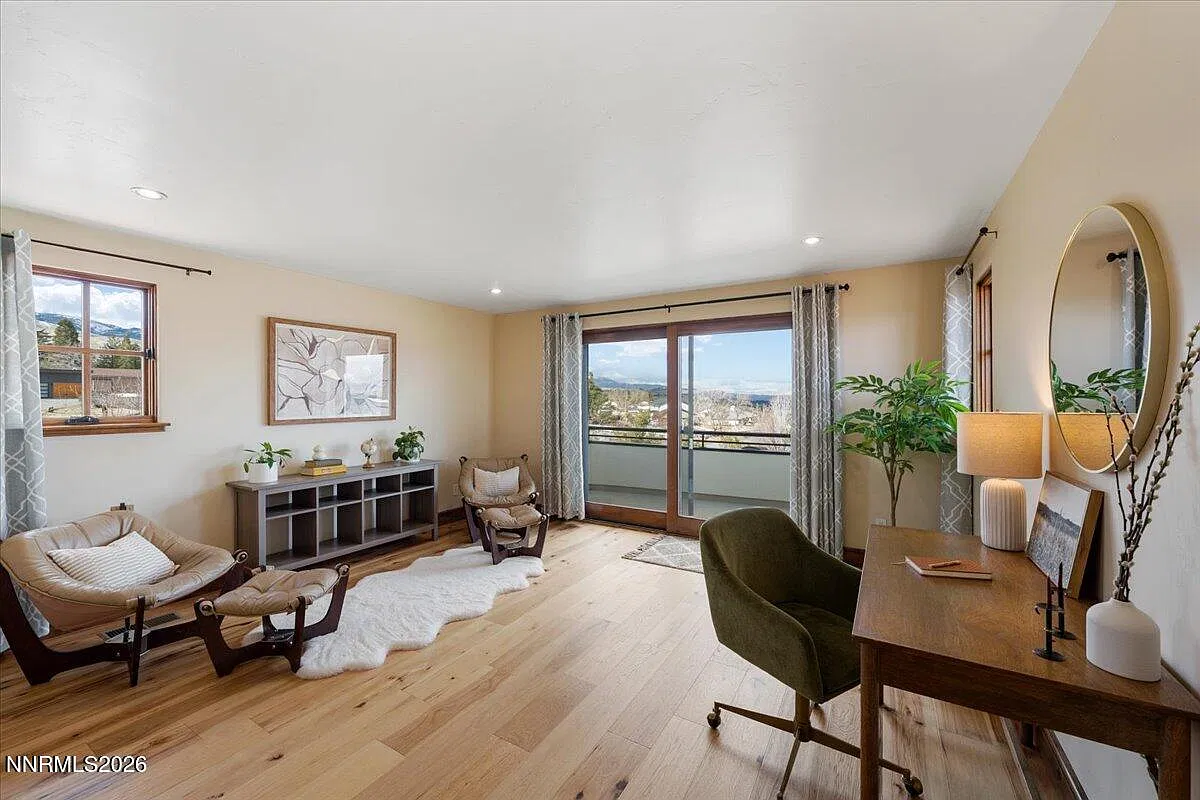 Top-floor office with a slider to the roof deck